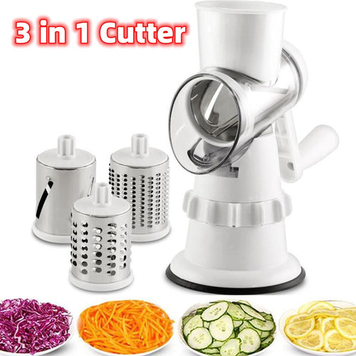 White hand-crank rotary vegetable slicer with three interchangeable metal drum blades and illustrated cut vegetables.