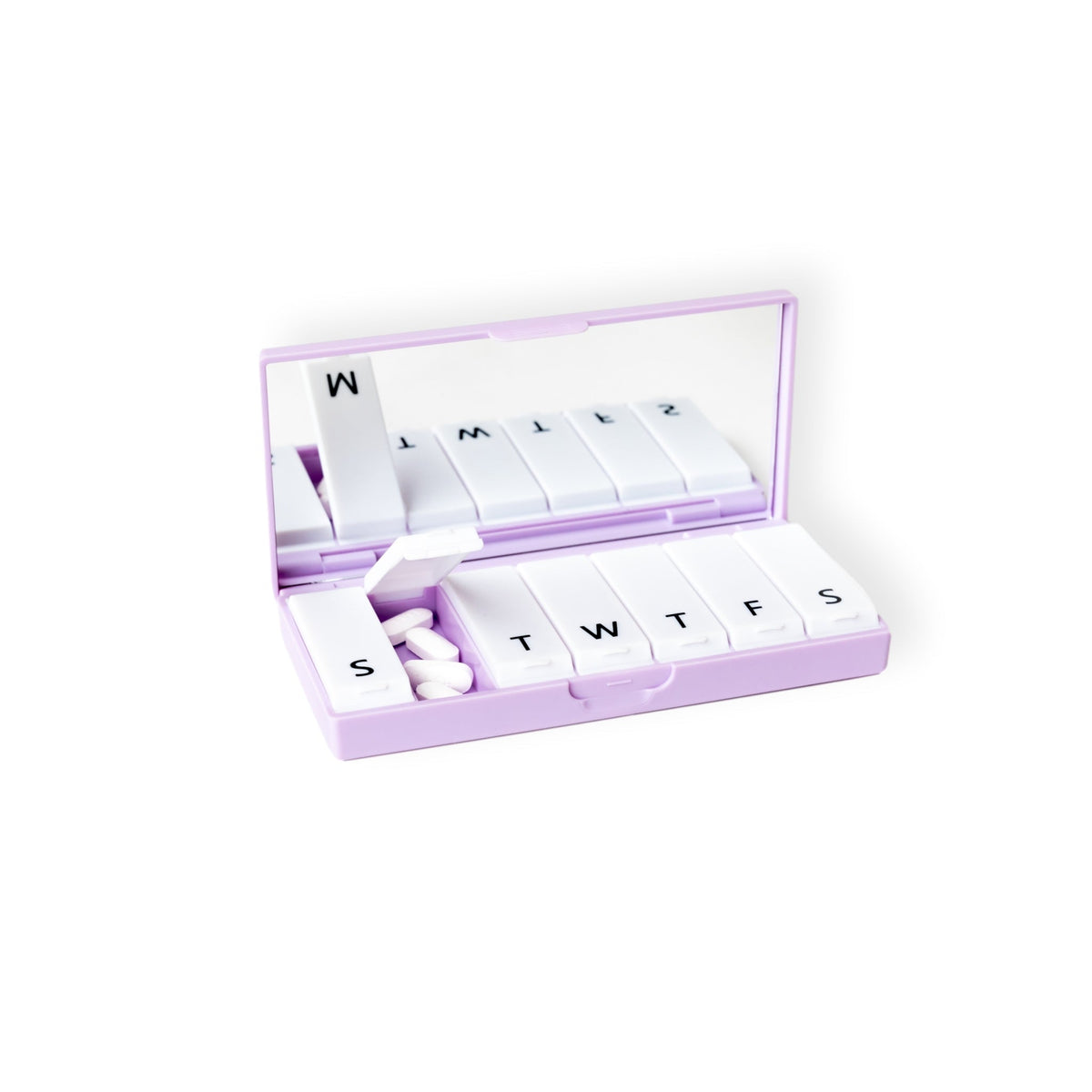 Open lilac weekly pill organizer with mirror, white day-labeled compartments and small tablets.